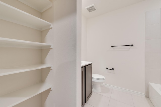 full bath featuring tile patterned flooring, a washtub, toilet, vanity, and visible vents
