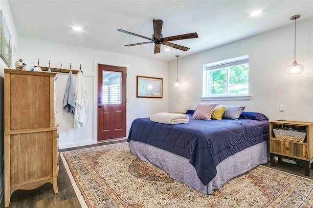 bedroom with ceiling fan, recessed lighting, and wood finished floors