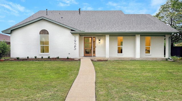 1925 Berkner Dr, Richardson, TX 75081 - view of front facade with a shingled roof, brick siding, a front yard, and a porch