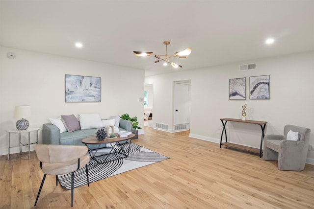 1925 Berkner Dr, Richardson, TX 75081 - living room featuring light wood-style floors, a chandelier, baseboards, and recessed lighting