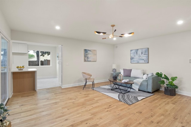 1925 Berkner Dr, Richardson, TX 75081 - living area with a chandelier, light wood-type flooring, recessed lighting, and baseboards