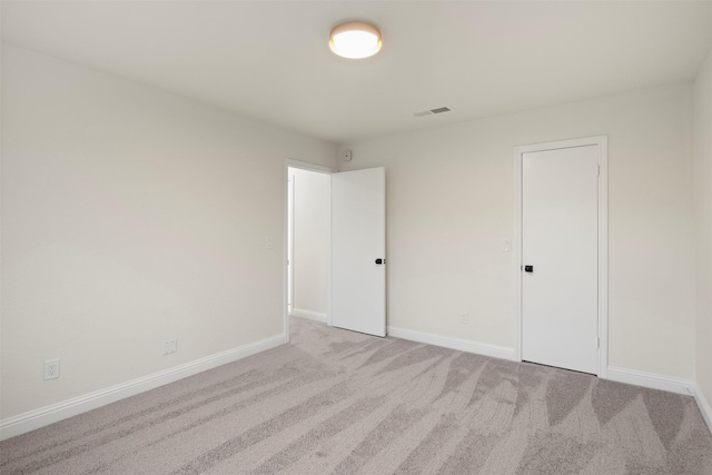 1925 Berkner Dr, Richardson, TX 75081 - unfurnished bedroom featuring light colored carpet and baseboards