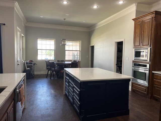 251 Rs County Road 3430, Emory, TX 75440 - kitchen featuring a center island, baseboards, recessed lighting, light stone countertops, and appliances with stainless steel finishes