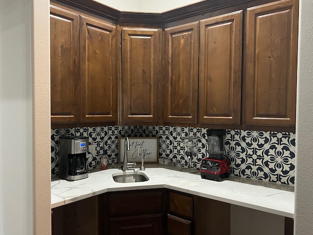 251 Rs County Road 3430, Emory, TX 75440 - kitchen featuring dark brown cabinetry, light stone countertops, and a sink