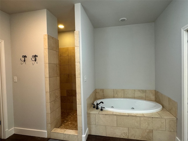251 Rs County Road 3430, Emory, TX 75440 - full bath featuring a tub with jets and tiled shower