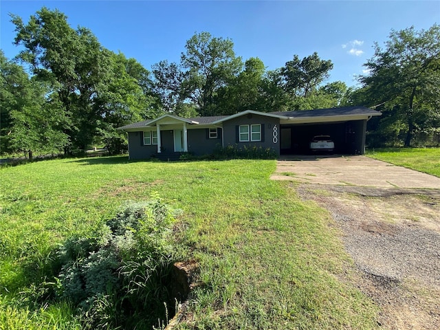 600 Bunny Rabbit Rd N, Athens, TX 75751 - ranch-style home with driveway, a front yard, and a carport