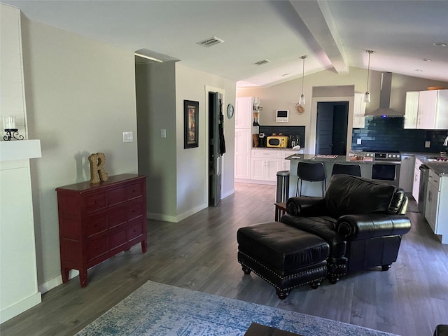 600 Bunny Rabbit Rd N, Athens, TX 75751 - living room with dark wood-type flooring, visible vents, baseboards, and lofted ceiling with beams