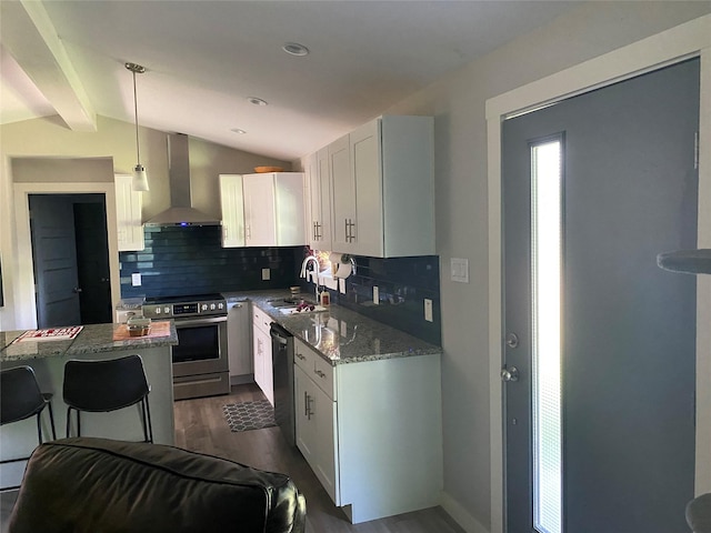 600 Bunny Rabbit Rd N, Athens, TX 75751 - kitchen with dark wood-style floors, vaulted ceiling with beams, wall chimney exhaust hood, black dishwasher, and stainless steel electric range oven