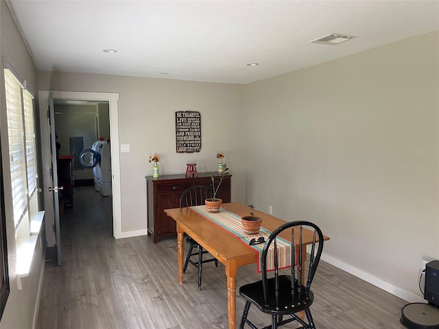 600 Bunny Rabbit Rd N, Athens, TX 75751 - dining area with visible vents, baseboards, and wood finished floors