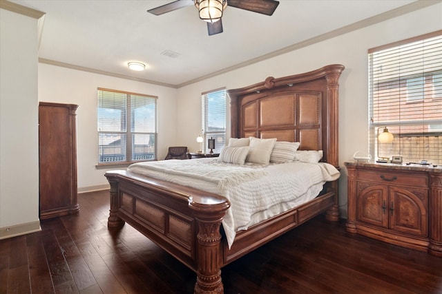 bedroom with visible vents, baseboards, a ceiling fan, crown molding, and dark wood-type flooring