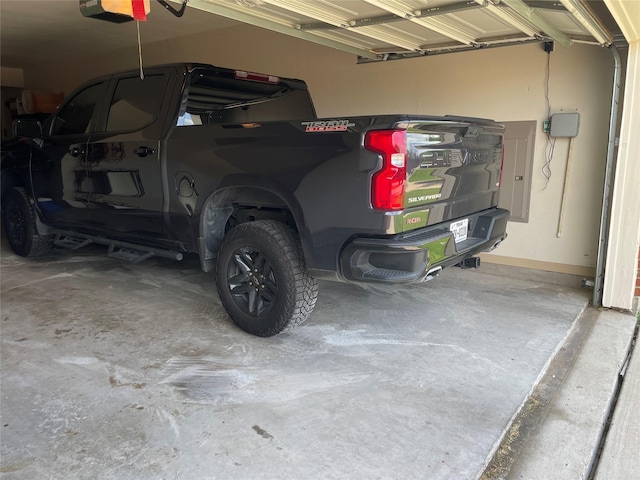 3852 Banner Dr, Frisco, TX 75034 - garage featuring a garage door opener
