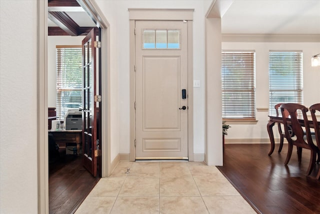 3852 Banner Dr, Frisco, TX 75034 - foyer entrance with wood finished floors and crown molding