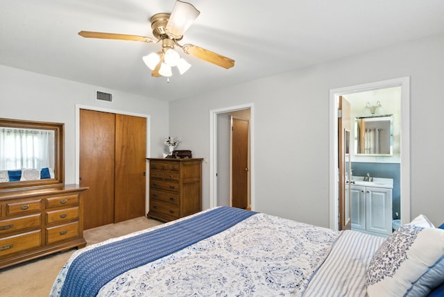 6050 Douglas St, Fort Worth, TX 76114 - bedroom with light carpet, a closet, a ceiling fan, and connected bathroom