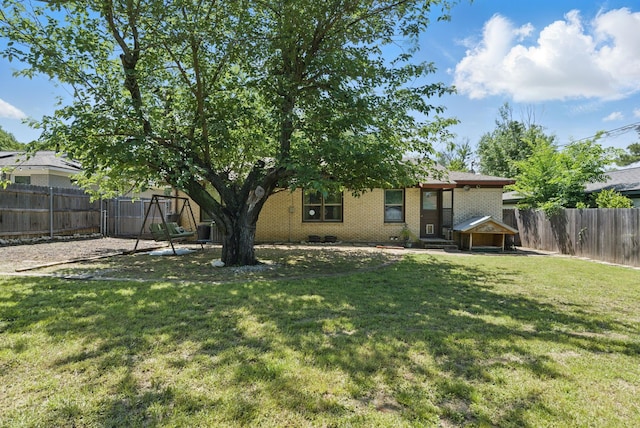 view of yard featuring a fenced backyard