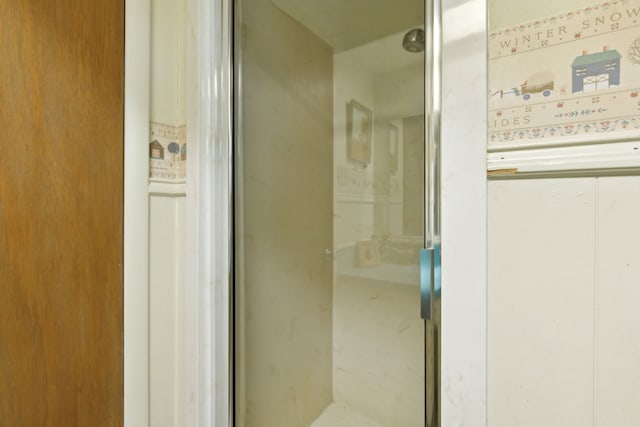 bathroom with a shower stall