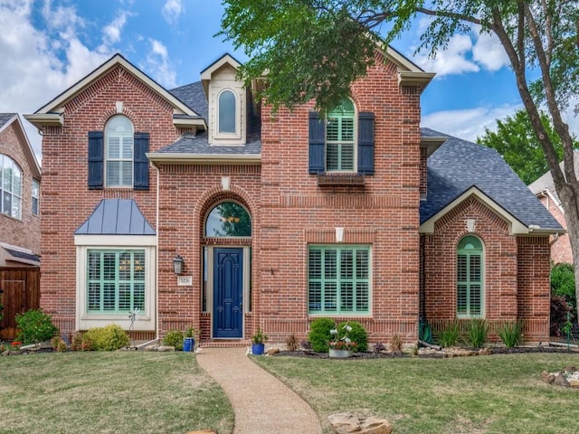 3226 Appleblossom Dr, Frisco, TX 75033 - traditional-style home with brick siding, a shingled roof, and a front yard
