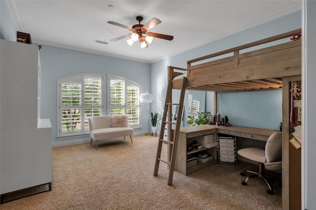 carpeted bedroom featuring a ceiling fan, baseboards, ornamental molding, and visible vents