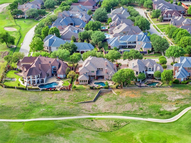birds eye view of property featuring a residential view and view of golf course