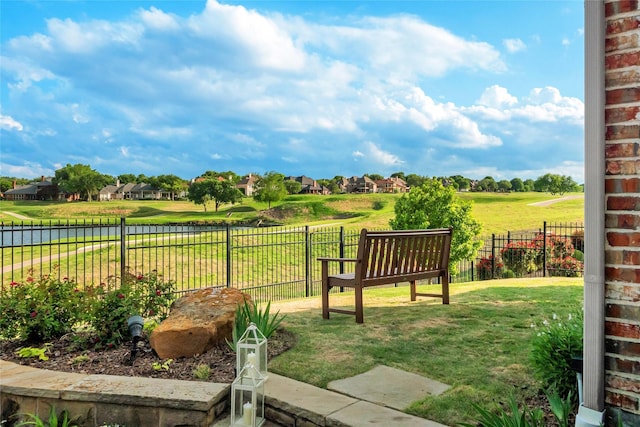 view of yard with a residential view and a fenced backyard