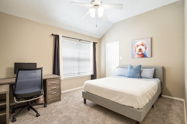 carpeted bedroom featuring lofted ceiling, baseboards, and ceiling fan
