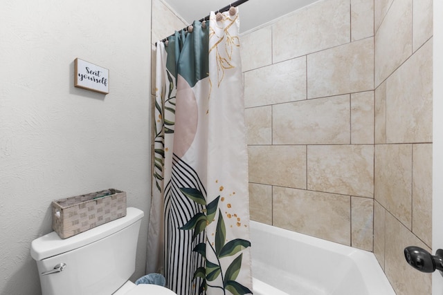 full bath with shower / tub combo and toilet