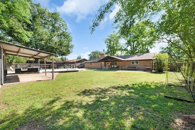122 Jill Ln, Sulphur Springs, TX 75482 - fenced backyard with outdoor lounge area, a patio area, and a swimming pool