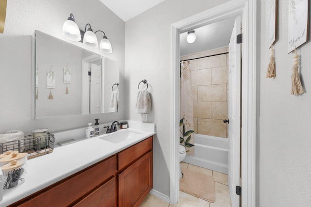 bathroom featuring shower / tub combo with curtain, vanity, tile patterned flooring, and toilet