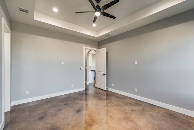 unfurnished bedroom with concrete flooring, visible vents, baseboards, and recessed lighting