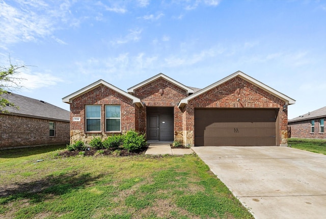 ranch-style house featuring an attached garage, brick siding, driveway, and a front lawn
