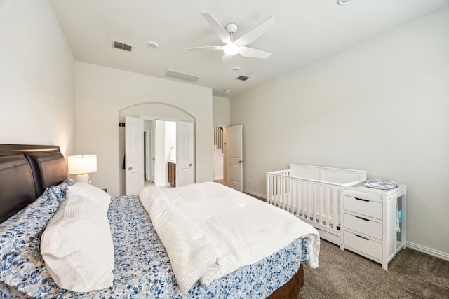 bedroom featuring carpet flooring, visible vents, ceiling fan, and baseboards