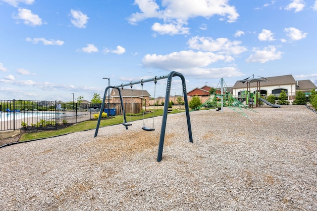 community jungle gym with fence