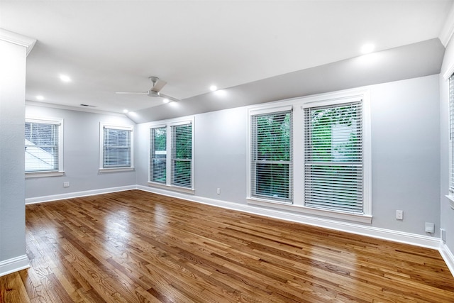 unfurnished room with baseboards, ceiling fan, and wood finished floors