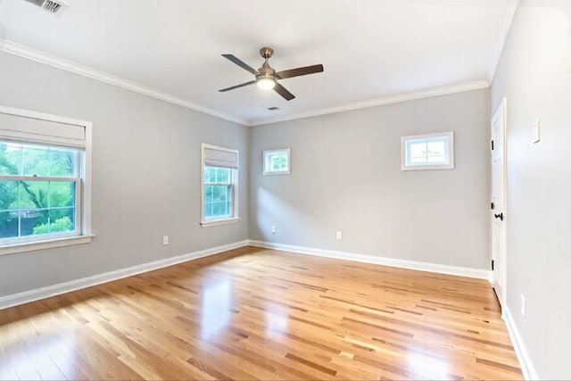unfurnished room with baseboards, a ceiling fan, and light wood-style flooring