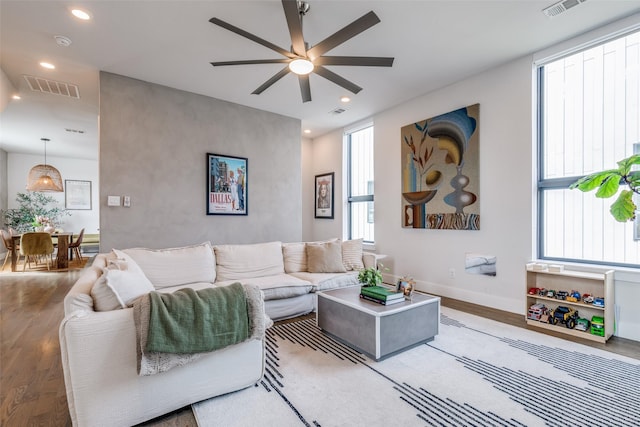 1922 La Croix Pl, Dallas, TX 75214 - living room featuring a ceiling fan, baseboards, wood finished floors, and recessed lighting