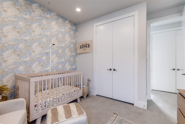1922 La Croix Pl, Dallas, TX 75214 - bedroom with baseboards, a crib, recessed lighting, and carpet