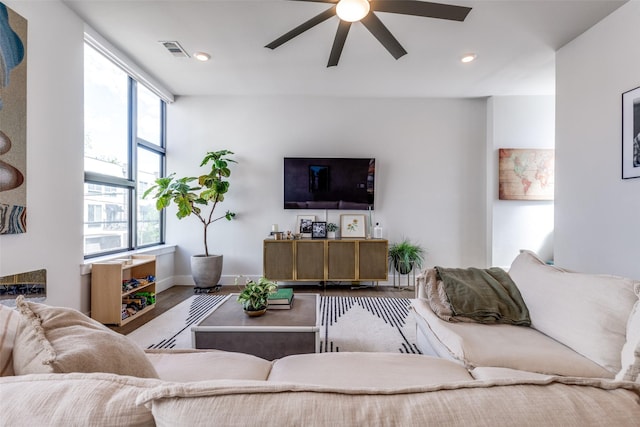 1922 La Croix Pl, Dallas, TX 75214 - kitchen with stainless steel appliances, range hood, a kitchen breakfast bar, modern cabinets, and a sink