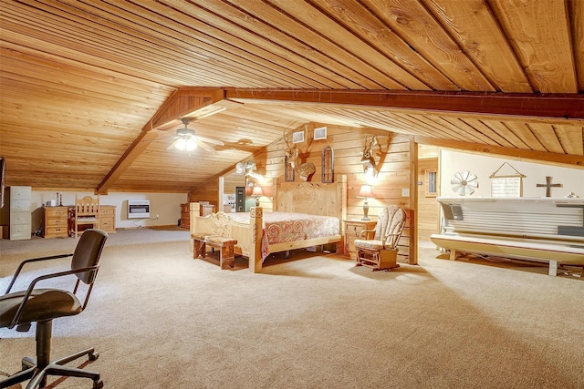 7203 Pump Station Rd, Jacksboro, TX 76458 - carpeted bedroom featuring wood ceiling, wood walls, and vaulted ceiling