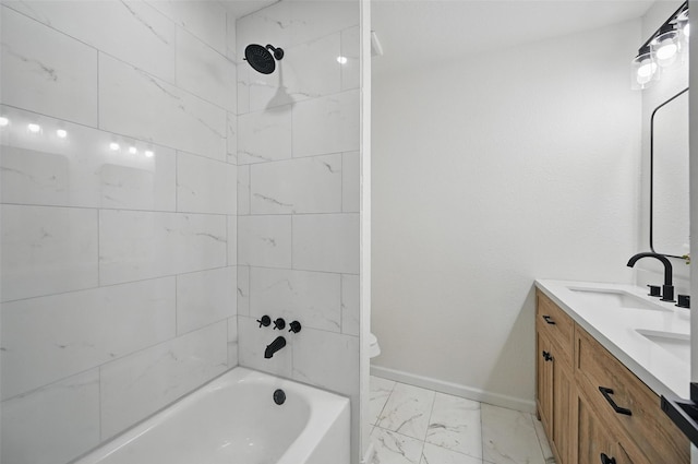 7200 Norma St, Fort Worth, TX 76112 - full bath with marble look tiles, double vanity, baseboards, shower / tub combination, and toilet