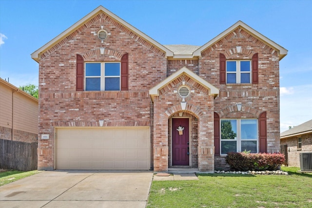 6521 Fitzgerald St, Fort Worth, TX 76179 - traditional-style home with driveway, brick siding, a front yard, and a garage