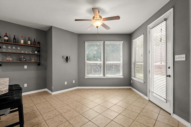 6521 Fitzgerald St, Fort Worth, TX 76179 - unfurnished dining area featuring plenty of natural light, a ceiling fan, and light tile patterned floors