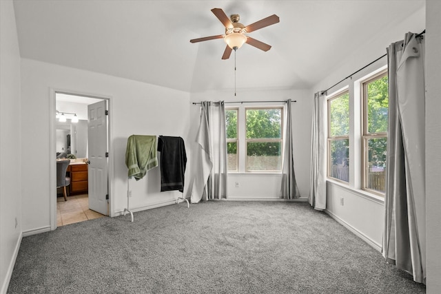 6521 Fitzgerald St, Fort Worth, TX 76179 - empty room with ceiling fan, lofted ceiling, carpet flooring, and baseboards