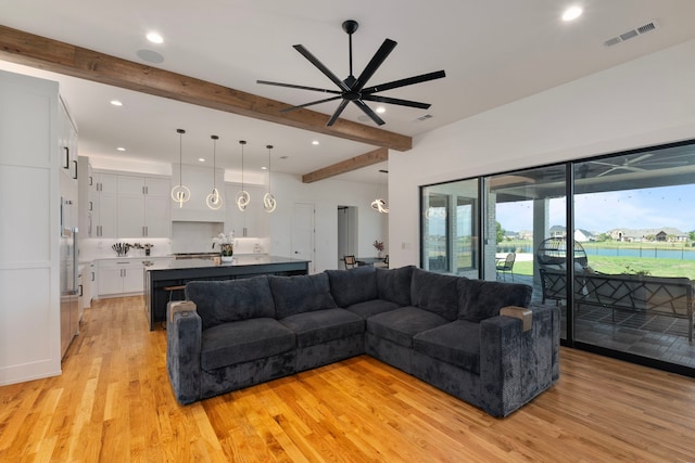 living room featuring light wood finished floors, visible vents, recessed lighting, beamed ceiling, and a ceiling fan