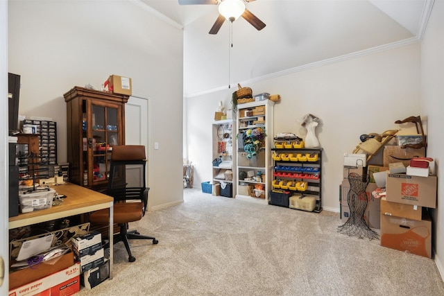 carpeted office featuring crown molding, baseboards, a ceiling fan, and high vaulted ceiling