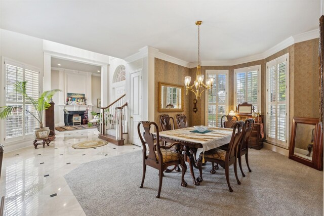 dining room with stairs, a notable chandelier, a healthy amount of sunlight, and wallpapered walls