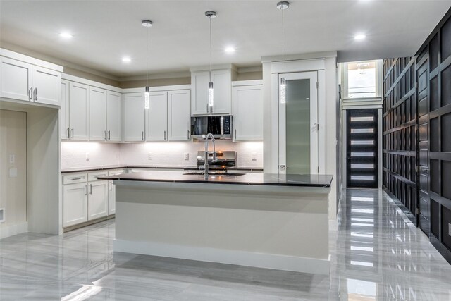 1963 Dennison St, Dallas, TX 75212 - kitchen featuring stainless steel microwave, backsplash, dark countertops, recessed lighting, and white cabinetry