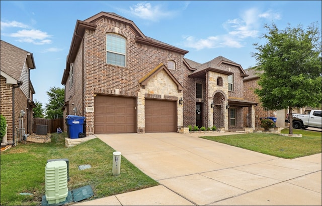 view of front of home featuring brick siding, a front yard, central air condition unit, and concrete driveway