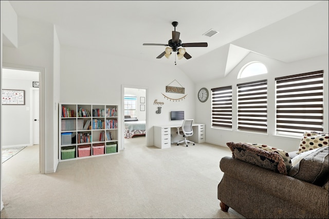 living area with visible vents, a ceiling fan, carpet flooring, and vaulted ceiling