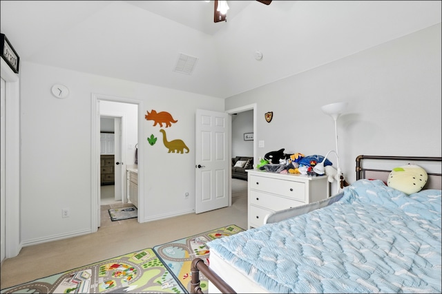 bedroom with ensuite bath, light carpet, visible vents, and baseboards