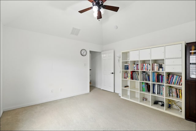 unfurnished room with visible vents, carpet floors, baseboards, high vaulted ceiling, and ceiling fan