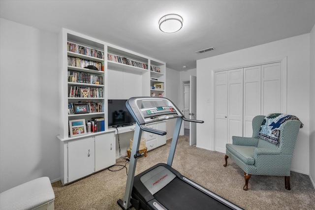 1410 Hummingbird Dr, Hillsboro, TX 76645 - workout area featuring visible vents and light carpet